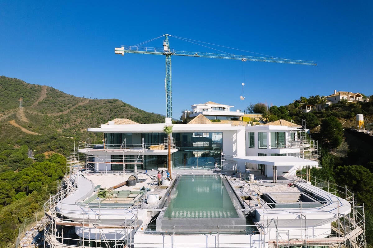 Promoción inmobiliaria en construcción - financiación Marca Machinery